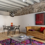 Byt s oblou stěnou – obytná místnost Foto: Ottavio Tomasini