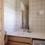 Malý dům s kloboukem velkého čaroděje. Na švédském pobřeží se dějí věci. Foto: Christopher Hunt