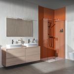 Nábytek v dřevodekoru a tlumené odstíny přispívají k harmonické atmosféře celé koupelny. Skříňky ze série Cubito značky JIKA byly navrženy v minimalistickém nadčasovém stylu bez rušivých elementů. Zdroj: JIKA – Laufen CZ