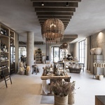 Alpská stodola, která je hotelem, dílnou, prodejnou i degustačním salónkem. Foto: Alex Filz