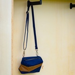 Kabinky z překližky pro důstojné přečkání zimy bez domova. Malý projekt s velkým významem. Foto: Michelle Urbiztondo