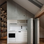 Střední místnost patra s kuchyňkou. Foto: Tomáš Slavík