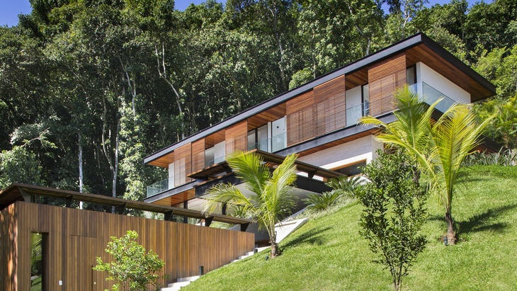 Moderní dům, který se přizpůsobuje terénu a zachovává kontakt s krajinou Foto: Denilson Machado/ MCA Estúdio