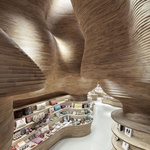 Nekonečné křivky. Interiér obchodu se suvenýry připomíná jeskyni Foto: Tom Ferguson Photography
